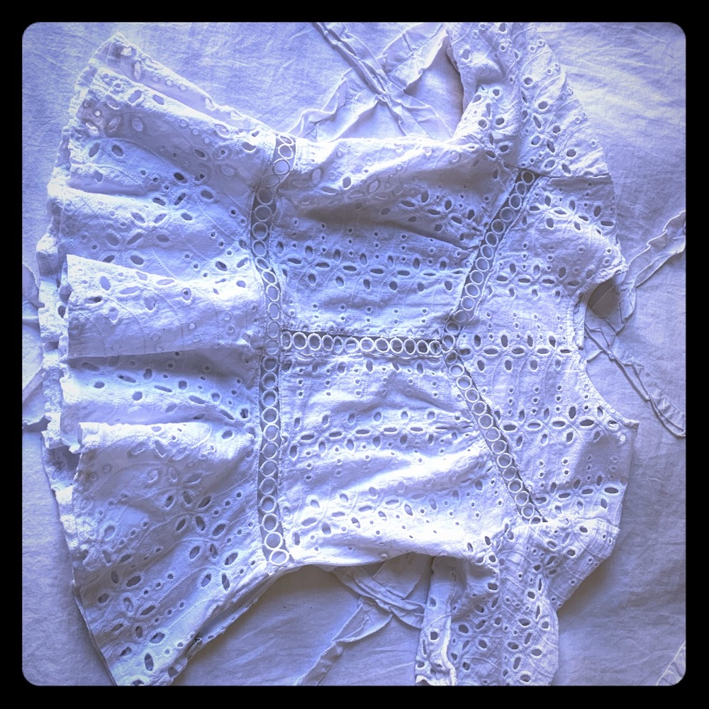 Eyelet peplum blouse